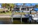 Private boat dock on canal-front property at 18170 Avonsdale Cir, Port Charlotte, FL 33948