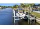 Private boat lift on canal-front property at 18170 Avonsdale Cir, Port Charlotte, FL 33948