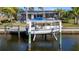 Private boat lift on canal-front property at 18170 Avonsdale Cir, Port Charlotte, FL 33948