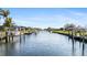 Scenic view of canal with waterfront homes and docks at 18170 Avonsdale Cir, Port Charlotte, FL 33948