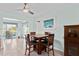 Small dining area with square table and four chairs, adjacent to the kitchen at 18170 Avonsdale Cir, Port Charlotte, FL 33948