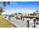 Private dock with boat lift and seating area at 18170 Avonsdale Cir, Port Charlotte, FL 33948