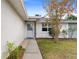 Inviting front entry with walkway and landscaping at 18170 Avonsdale Cir, Port Charlotte, FL 33948