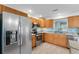 Modern kitchen with stainless steel appliances and granite countertops at 18170 Avonsdale Cir, Port Charlotte, FL 33948