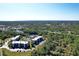 Condo community near lake and highway, showcasing resort-style amenities at 1999 Kings Hwy # 23C, Punta Gorda, FL 33980