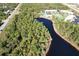 Peaceful condo community with lake, tennis court, and pool at 1999 Kings Hwy # 23C, Punta Gorda, FL 33980