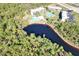 Condo community nestled in nature near a serene lake at 1999 Kings Hwy # 23C, Punta Gorda, FL 33980