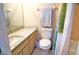 Bathroom with granite countertop and shower/tub combo at 1999 Kings Hwy # 23C, Punta Gorda, FL 33980