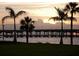 Sunset view over calm water and bridge at 1999 Kings Hwy # 23C, Punta Gorda, FL 33980