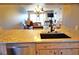 Kitchen with granite countertops and modern sink at 1999 Kings Hwy # 23C, Punta Gorda, FL 33980