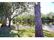 Serene pond view with lush greenery at 1999 Kings Hwy # 23C, Punta Gorda, FL 33980