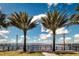 Scenic waterfront view with bridge and palm trees at 1999 Kings Hwy # 23C, Punta Gorda, FL 33980