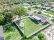 Aerial view showcasing house, backyard, and shed at 20430 Dial Ave, Port Charlotte, FL 33952