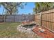 Landscaped backyard with pond and flamingo decor at 21190 Midway Blvd, Port Charlotte, FL 33952