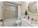 Clean bathroom with a shower/tub combo and vanity at 21190 Midway Blvd, Port Charlotte, FL 33952