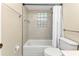 Simple bathroom with shower/tub and white toilet at 21190 Midway Blvd, Port Charlotte, FL 33952