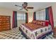 Spacious bedroom with a king-size bed and large dresser at 21190 Midway Blvd, Port Charlotte, FL 33952