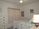 Bedroom with queen-size bed and built-in storage at 2180 Heron Lake Dr # K-208, Punta Gorda, FL 33983