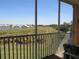 Spacious screened balcony overlooking a serene landscape at 2180 Heron Lake Dr # K-208, Punta Gorda, FL 33983