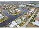 Aerial view showcasing waterfront homes and community at 2218 Cassino Ct, Punta Gorda, FL 33950