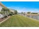 Landscaped backyard with canal view and lush greenery at 2218 Cassino Ct, Punta Gorda, FL 33950