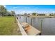 Private dock with steps providing convenient canal access at 2218 Cassino Ct, Punta Gorda, FL 33950