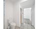 Unfinished bathroom with toilet and access to other rooms at 230 Waterway Ne Cir, Port Charlotte, FL 33952