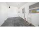 Unfinished laundry room with new drywall at 230 Waterway Ne Cir, Port Charlotte, FL 33952