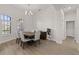 Formal dining room featuring hardwood floors and a spacious layout at 2408 Silver Palm Rd, North Port, FL 34288