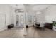 Bright dining area with hardwood floors and elegant chandelier at 2408 Silver Palm Rd, North Port, FL 34288