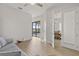 Home office with French doors opening to the pool at 2408 Silver Palm Rd, North Port, FL 34288