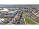 Aerial view of the house and surrounding golf course community at 24356 Westgate Blvd, Punta Gorda, FL 33980