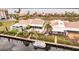 Aerial view of waterfront property with private dock and boat slip at 25188 Marion Ave # 34, Punta Gorda, FL 33950