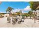 Outdoor deck features patio furniture and water views at 25188 Marion Ave # 34, Punta Gorda, FL 33950