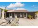 Screened patio with outdoor furniture and plants at 25188 Marion Ave # 34, Punta Gorda, FL 33950