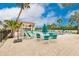 Enjoy this relaxing pool area with lounge chairs and tables at 25188 Marion Ave # 34, Punta Gorda, FL 33950