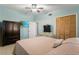 Spacious bedroom with queen bed, dresser, and large closet at 2544 Warne St, Port Charlotte, FL 33952