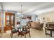 Dining area with glass-top table and wood chairs at 2544 Warne St, Port Charlotte, FL 33952