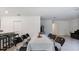 Dining area with table and chairs, view of living room and kitchen at 2784 Dode Ave, North Port, FL 34288