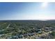 Aerial view of homes and lush landscape near the water at 2812 Cabaret St, Port Charlotte, FL 33948