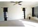 Bright bedroom with ceiling fan and neutral carpeting at 2812 Cabaret St, Port Charlotte, FL 33948