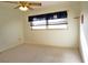 Simple bedroom with neutral walls and carpeted floors at 2812 Cabaret St, Port Charlotte, FL 33948