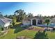 Single story home with well maintained lawn and landscaping at 2812 Cabaret St, Port Charlotte, FL 33948