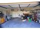 Large garage with plenty of storage shelves and overhead storage at 2812 Cabaret St, Port Charlotte, FL 33948