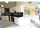 Modern kitchen with black and white countertops at 2812 Cabaret St, Port Charlotte, FL 33948