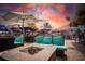 Outdoor patio with fire pit and seating area at 2812 Cabaret St, Port Charlotte, FL 33948