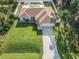 House with a pool and a large backyard, seen from above at 2970 Cascabel Ter, North Port, FL 34286