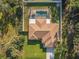 Top-down view of a house with a pool and fenced backyard at 2970 Cascabel Ter, North Port, FL 34286