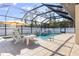 Enjoy the sunshine by the pool; this backyard is a true escape at 2970 Cascabel Ter, North Port, FL 34286