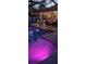 Night view of the pool with lighting, creating a magical ambiance at 2970 Cascabel Ter, North Port, FL 34286